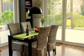 K 104 EG - moderne Ferienwohnung am See mit Sauna & Kamin